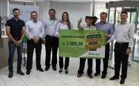 Nova Laranjeiras - Associado recebe prêmio da Promoção de Poupança Premiada do Sicredi