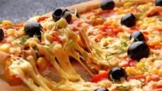 Pizza &eacute; o 'v&iacute;cio alimentar' mais dif&iacute;cil de ser combatido