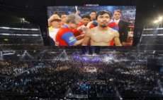 No boxe, p&uacute;blico de 51 mil pessoas assistiu a luta de Pacquiao no Cowboys Stadium, em 2010, com a ajuda destes tel&otilde;es gigantes em alta defini&ccedil;&atilde;o (Eric Gay/AP)