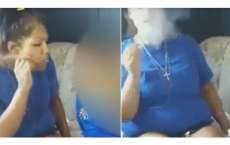 Mulher &eacute; presa ap&oacute;s soprar fuma&ccedil;a de maconha na boca de crian&ccedil;a. Veja o v&iacute;deo!