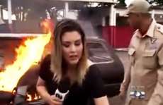 V&iacute;deo de jornalista apagando inc&ecirc;ndio com extintor ABC vira piada na internet. Veja
