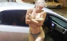 Mulher fica nua em p&aacute;tio de posto de combust&iacute;vel