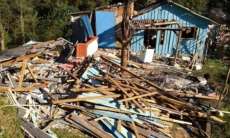 Mulher tem casa destru&iacute;da ap&oacute;s ser presa por assassinar crian&ccedil;a